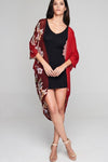 Model wearing red chiffon kimono with floral prints facing front